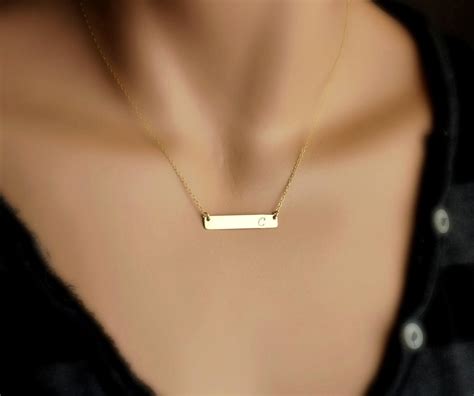 gold bar necklace with name.